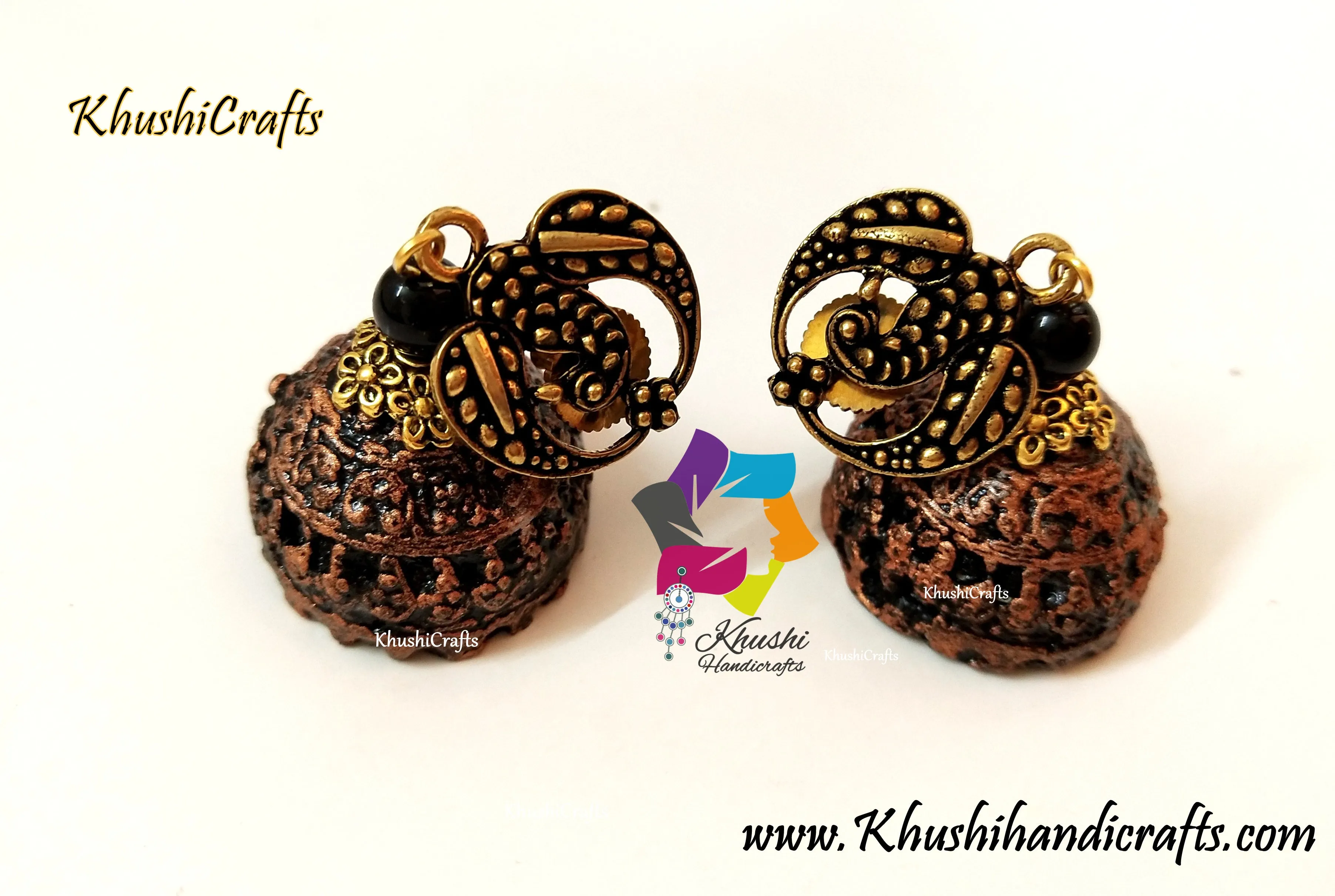 Bronze mettalic look clay jhumkas